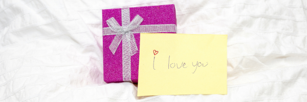 I love you note with purple gift