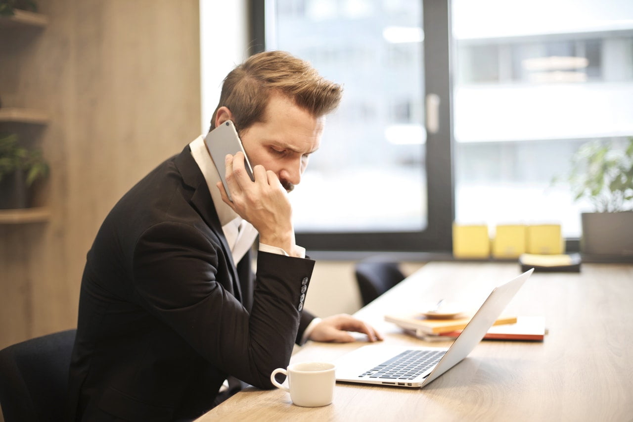 business traveler talking on phone