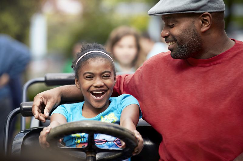 father and daughter in car