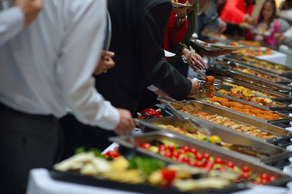 people group catering buffet food indoor in luxury restaurant with meat colorful fruits and vegetables