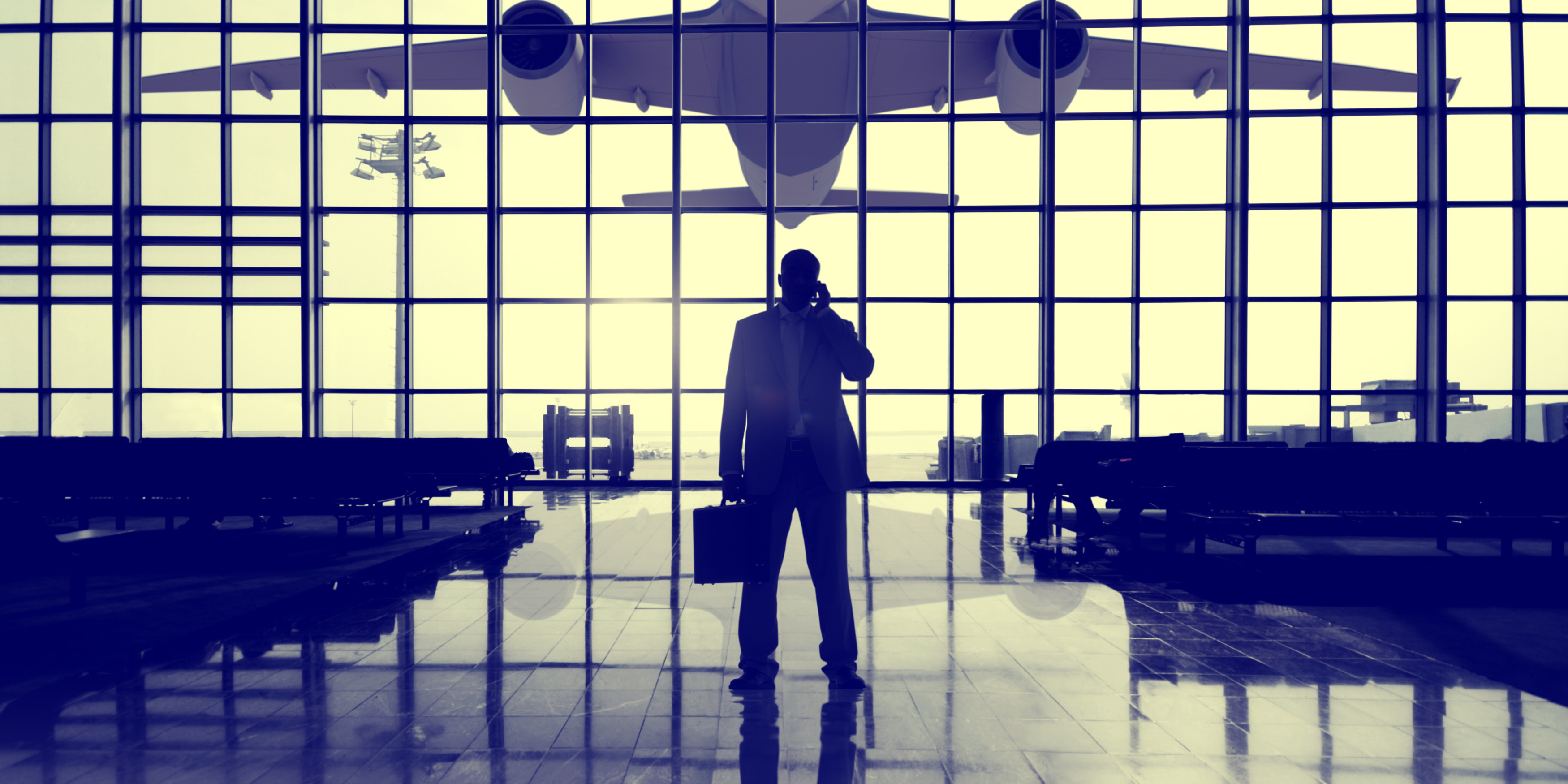 man-in-front-of-plane-in-air-port